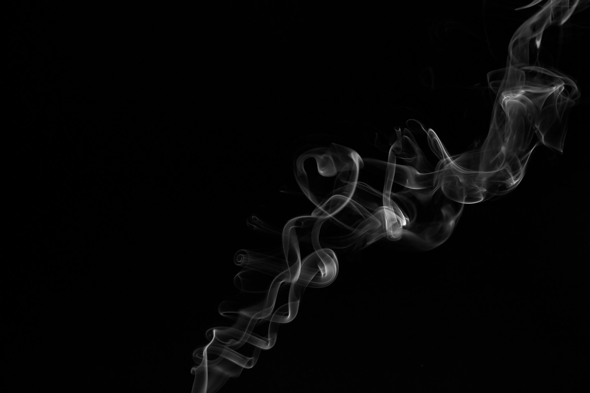 Photo of White Smoke on Black Background